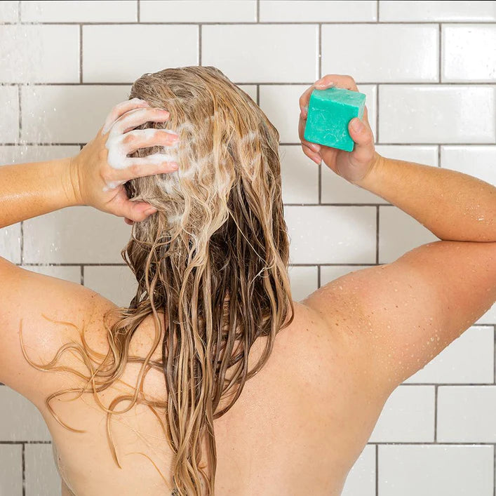 Ethique-Mintasy-Shampoo-Bar-in-use-shower-The Living Co.